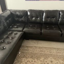 Contemporary Faux leather sectional couch Cost $1250 Originally 