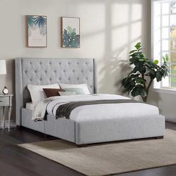 New Queen Brynn Upholstered Bed  Retails for over $500 Still new in box  Features: Fully Upholstered Headboard and Footboard Solid Wood Legs Foam Padd