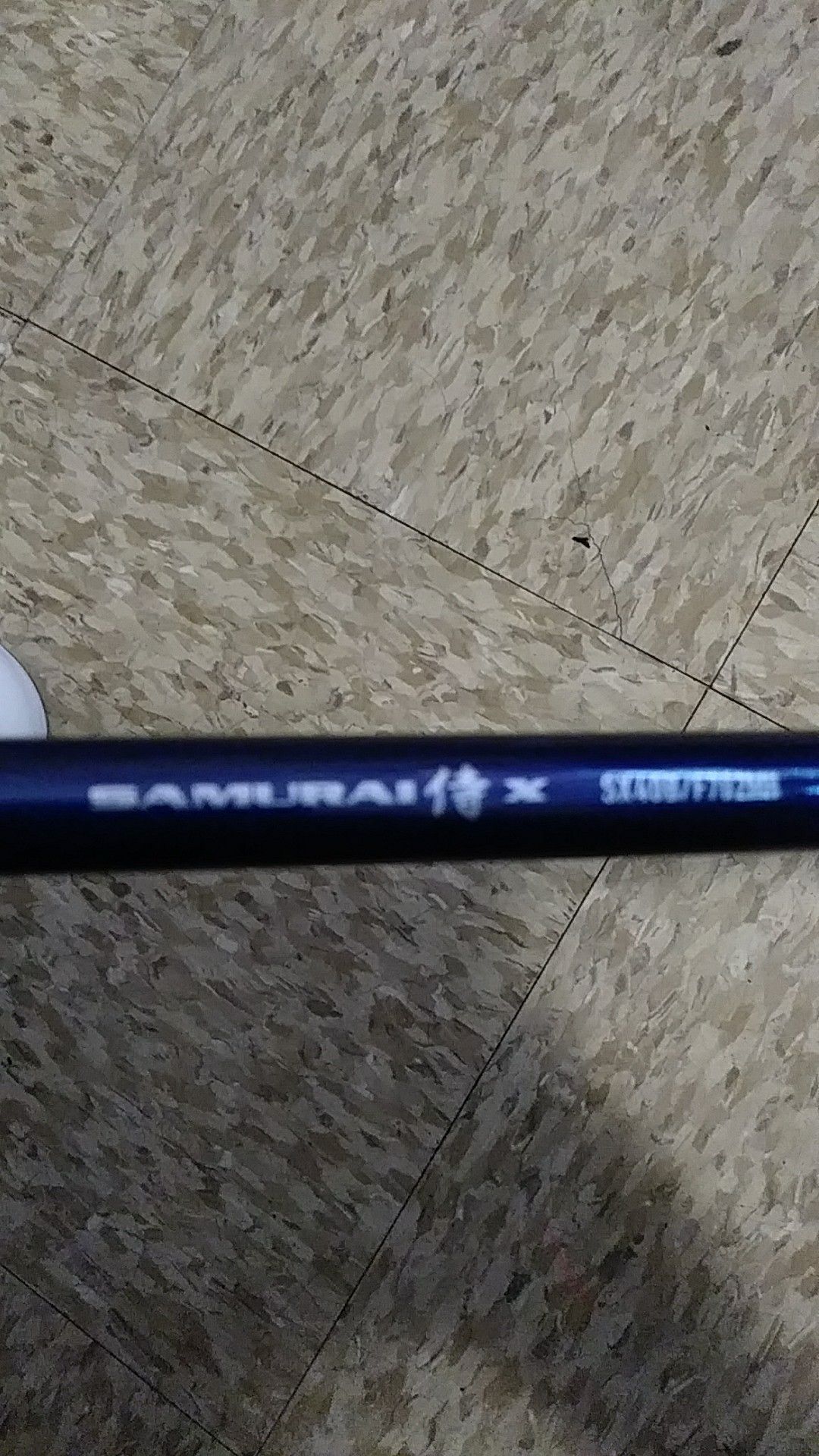 Samurai X SX40B/F702MH Fishing Rod with matching reel.