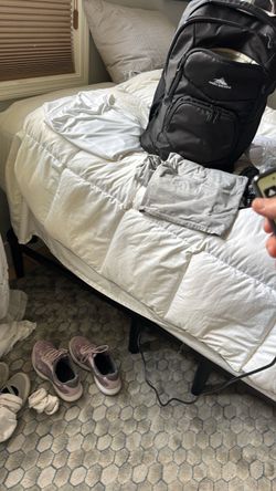 Queen metal bed frame - adjustable (head of bed moves up and down)