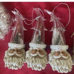 3 Belsnickle" style Santa, which is a German Santa figure With Snow Globe