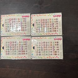 Brand new Claire’s stick on earrings