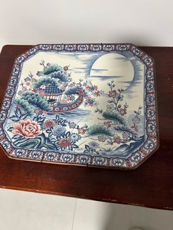 Platón de parte de porcelana