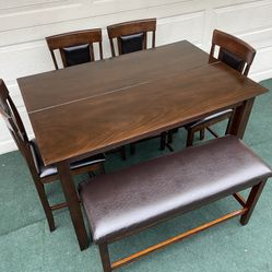 6-PC BROWN FINISH HIGH TOP DINING SET (TABLE WITH LEAF, LARGE PADDED BENCH AND 4 PADDED CHAIRS)