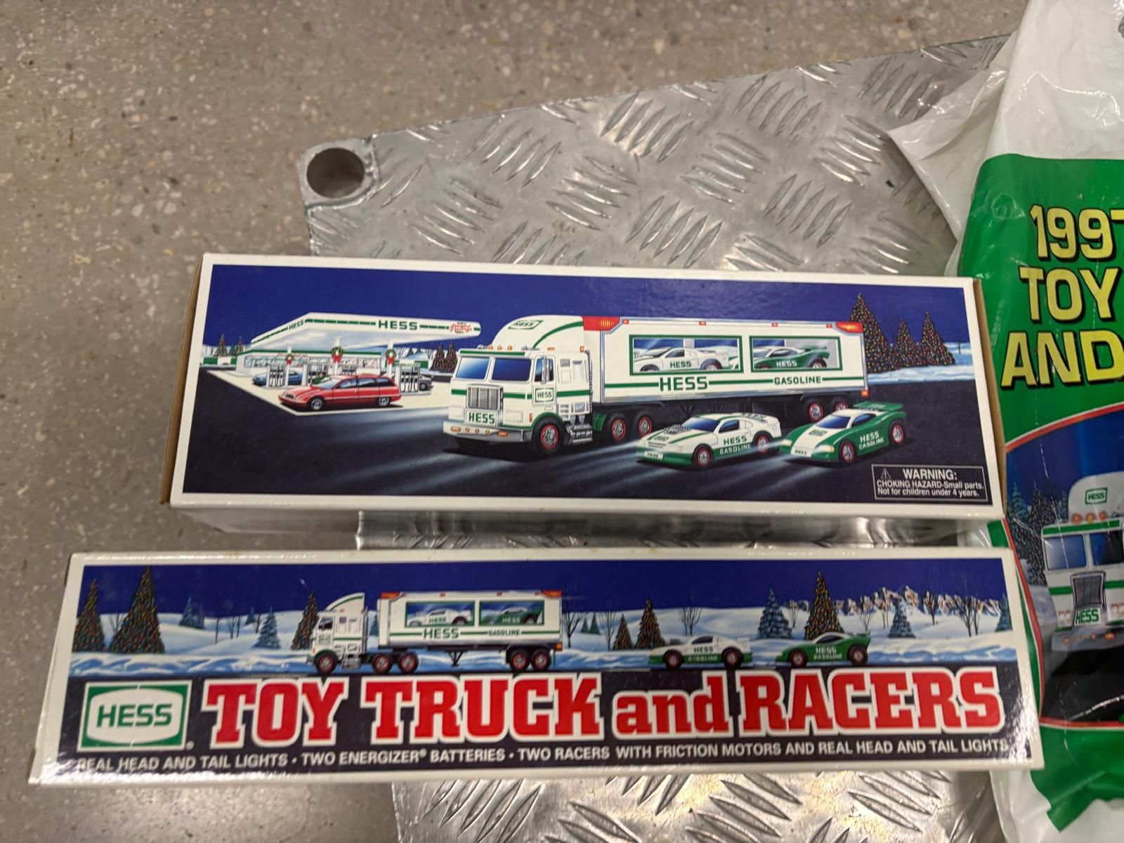 1997 Hess Toy Truck and Racers - New in Box in the original box and original plastic bag … $60 each