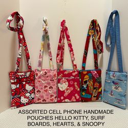 ASSORTED CELL PHONE HANDMADE POUCHES SOLD $22,00 A PIECE 