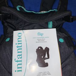 NWOT BLACK INFANTINO FLIP 4 IN 1 BABY CARRIER FOR NEWBORN TO TODDLERS 