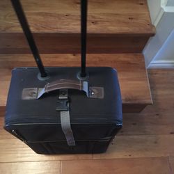 Carry On Suitcase  The Dimensions are ;24”H X 14” W x7,5”D   (78759 Nw Austin)