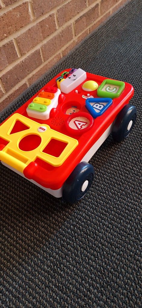 Fisher-Price Laugh & Learn Pull & Play Learning Wagon
