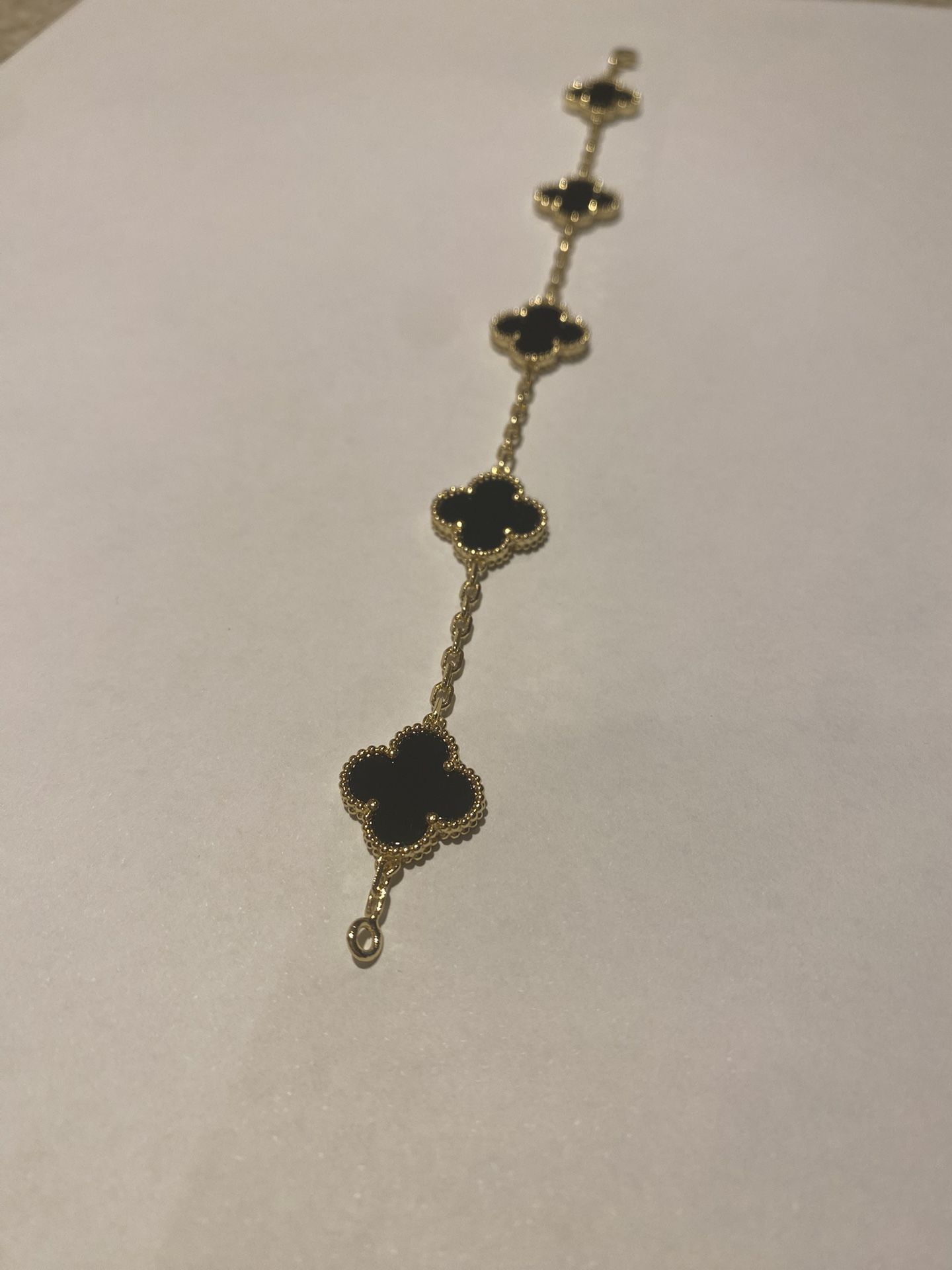 Black and Gold Vancleef Onyx Bracelet