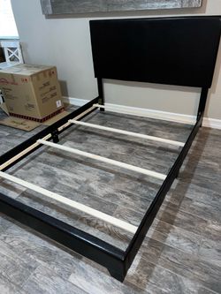 Black faux leather KING bed frame (new in the box)