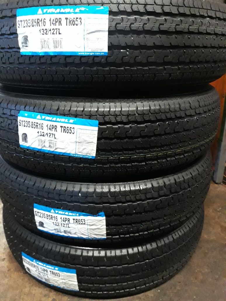 4 NEW TRAILER TIRES. ST235/85/16. (14) PLY
