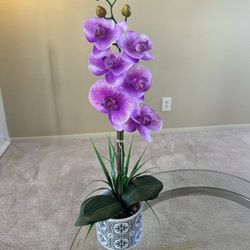 Purple Faux Orchid In A Ceramic Vase