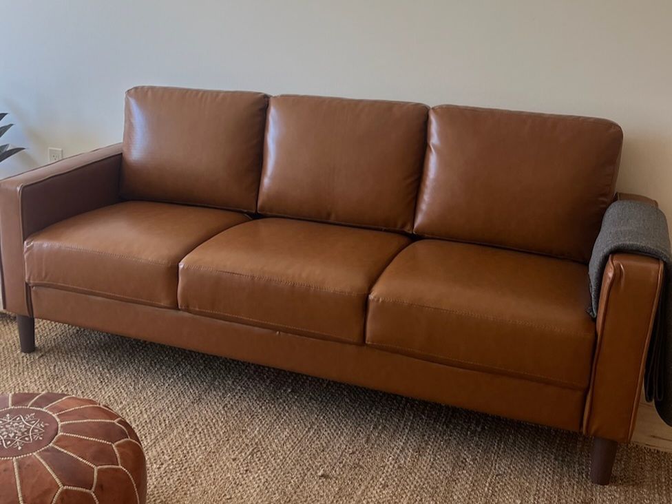 Sleek caramel sofa
