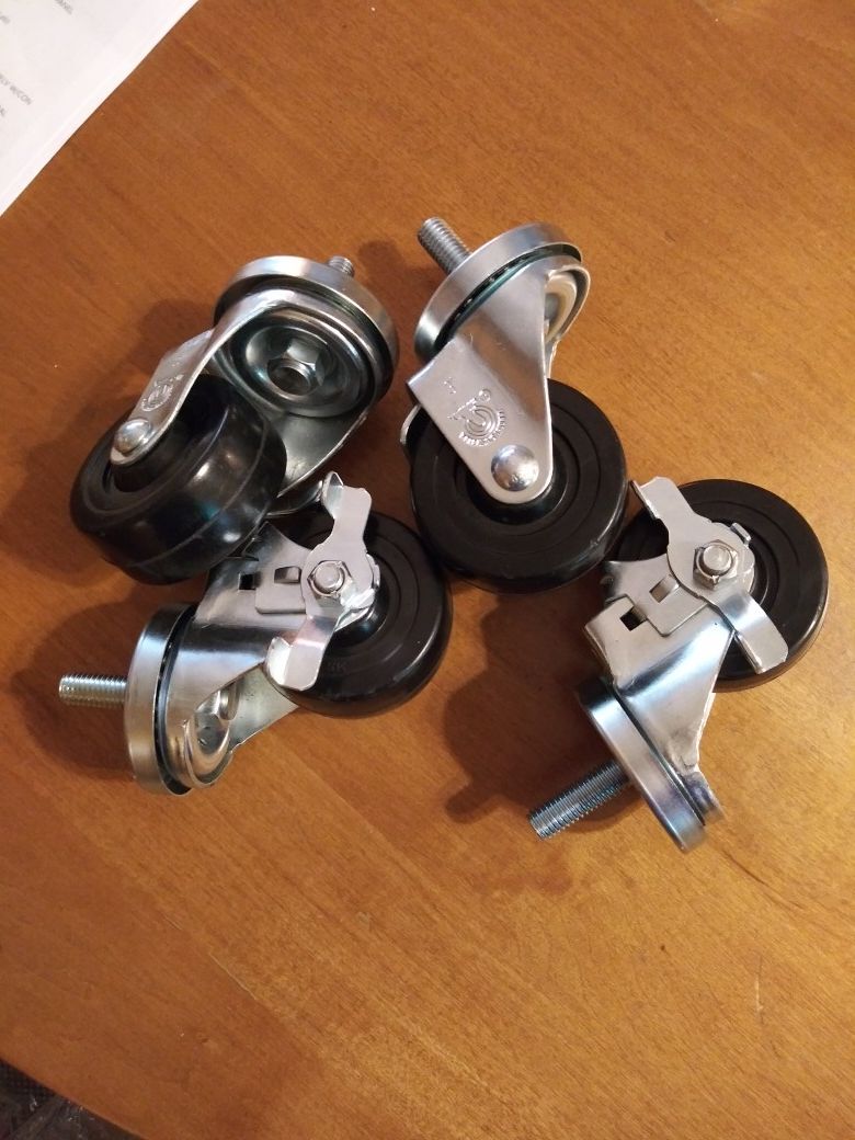 Set of 4 caster wheels w/brakes NEW