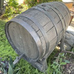 old wine barrel and citrus tree heater 
