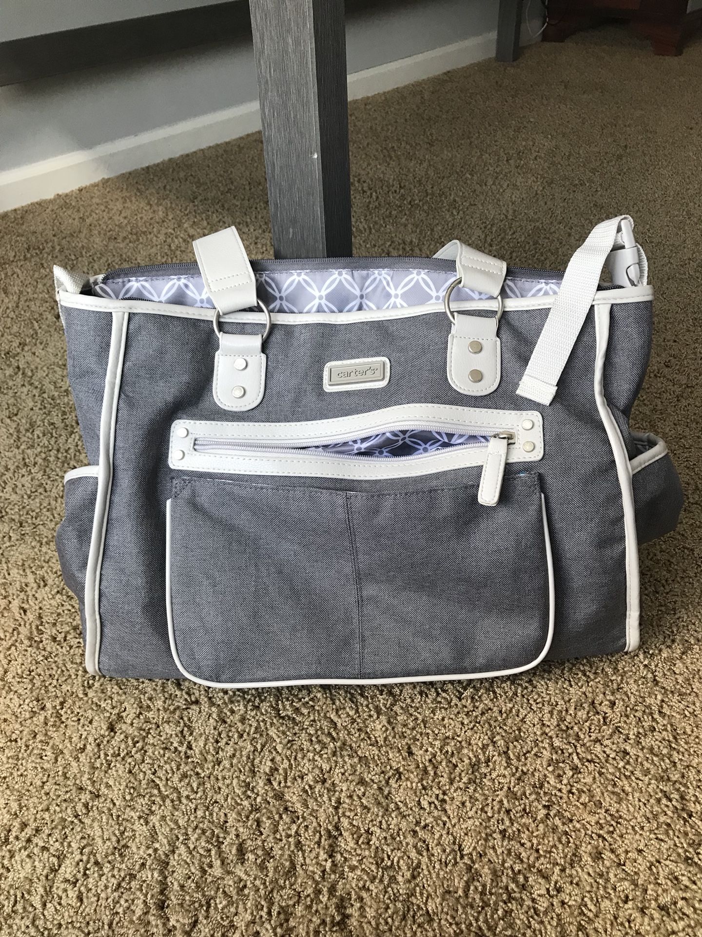 Baby diaper bags and changing pads