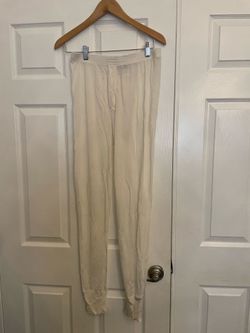 Lightweight silk thermal pants in size medium.