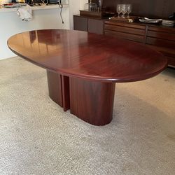 Vintage 1970s Danish oval Skovby dining table with butterfly Leaf in rosewood located near the Miami Design District