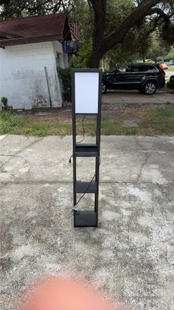 Lamp with charging port and plug-in