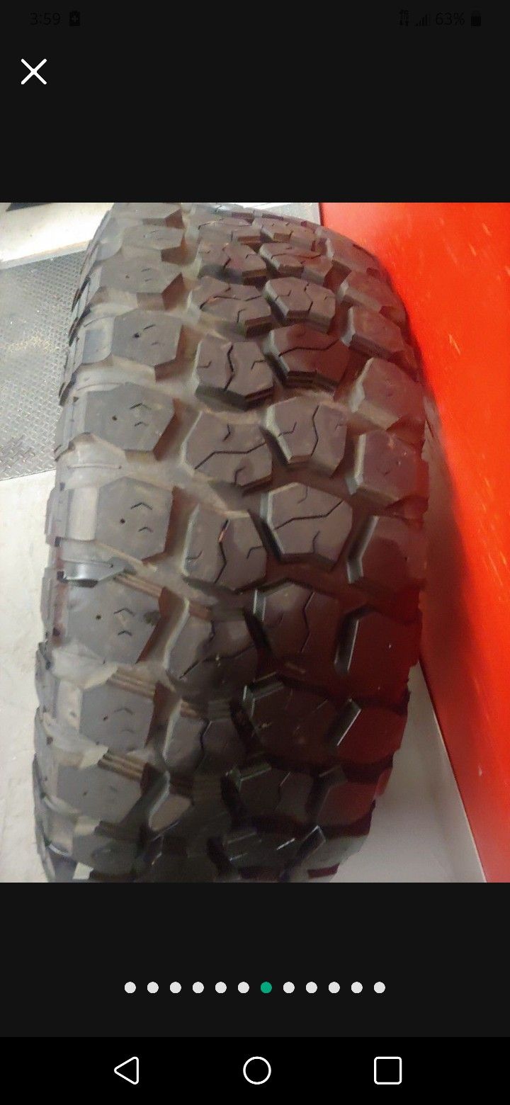 KMC Rockstar 2 XD Series 20x9 Rims 37" Ironman MT Tires (8x6.5 Lug Pattern) for Sale in