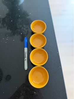 Set of 4 yellow pinch bowls
