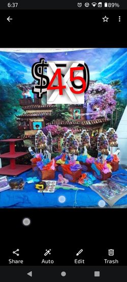 $50Encanto Birthday party decorations 7 center Pieces bottom part opens into a box there 18 1/2 inches tall 1 big 5x7 backdrop on a tarp