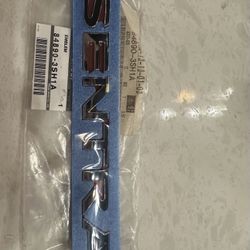 Nameplate - Nissan Santra (84890-3SH1A)