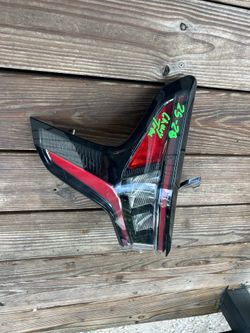 2025-26 CHEVY TRAX LF TAIL LIGHT LED AC EM