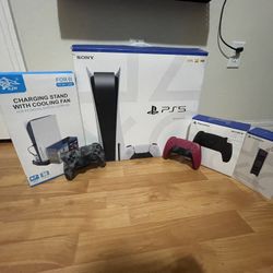 PS5 With 3 Controllers (not Including The One In The Box) A Charging Stand With A Cooling Fan And A Charging Stand