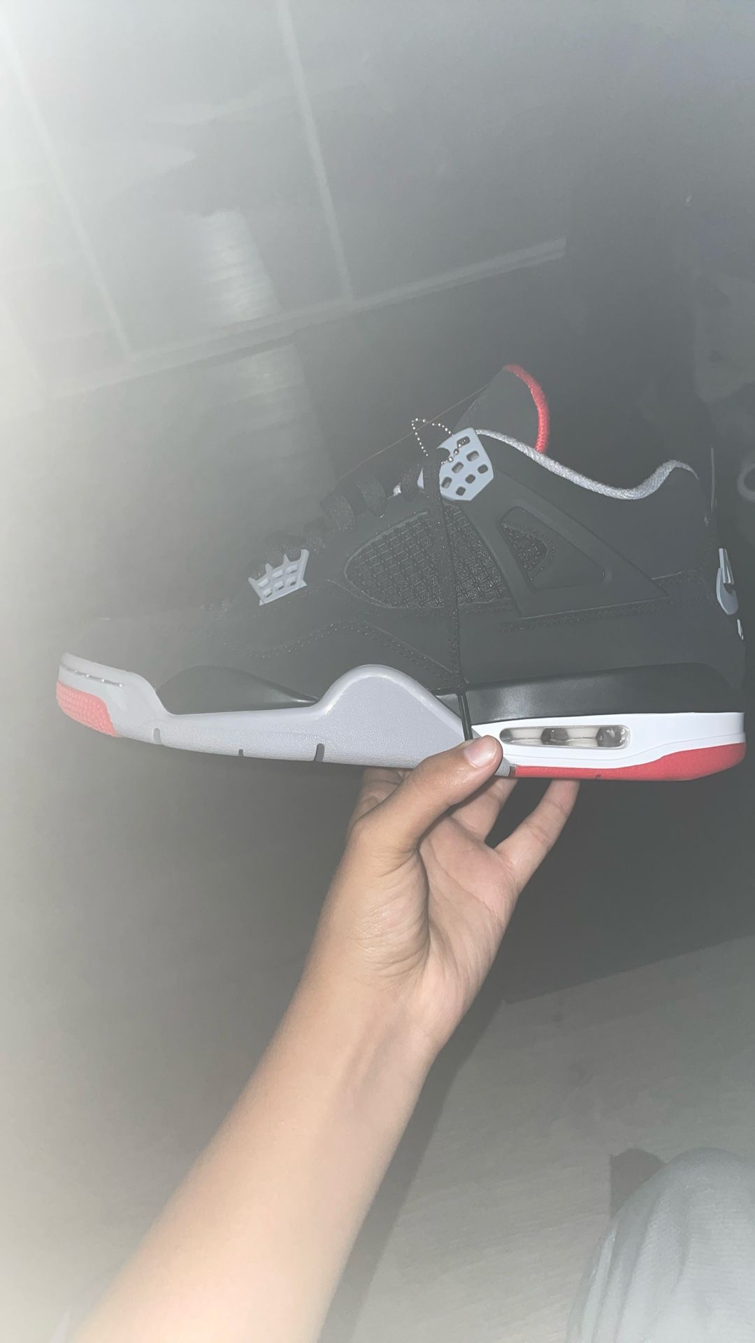 Jordan 4 Bred Real