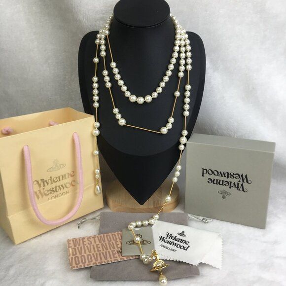Vivienne Westwood Irregular Three Row Pearl Bas Relief Choker in gold