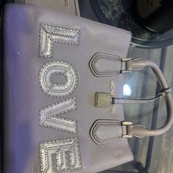 Michael Kors purse and wallet. Like new condition