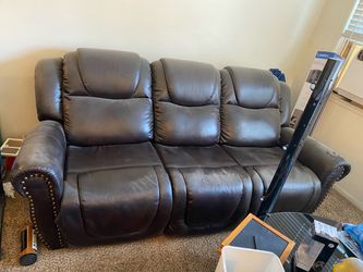 Couch - two sides recline. Selling as is and asap