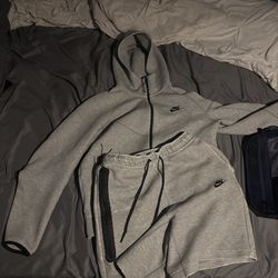Grey Nike tech fit