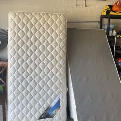 2 Like New Twin Serta Beds With Metal Frames 