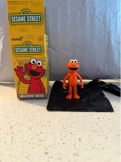 Super7 Sesame Street Elmo ReAction Figure Mystery Box - Orange Elmo