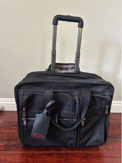 Tumi carry-on roll bag