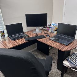 Home Office Setup. L Shape Table, Chair, Monitor, Keyboard, Mouse. 