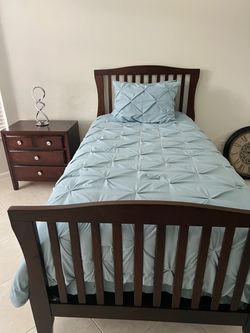 Twin bed  brown headboard and footboard