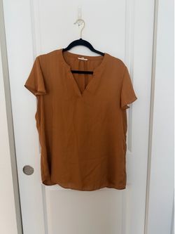 Orange Maurice’s shirt
