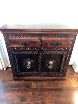 Carved Wood Cabinet with Brass Hardware