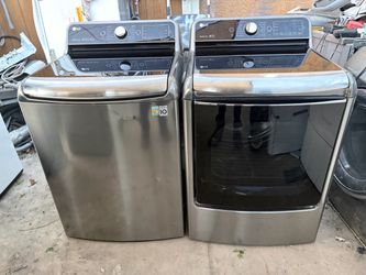 LG. WASHER AND GAS DRYER