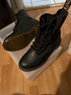 Lightly worn..Dr M. Daughter grew out of it. Very good condition