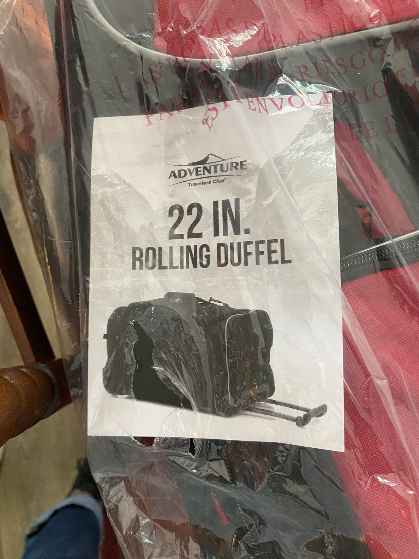 Adventure Travelers Club 22in Rolling Duffel Bag