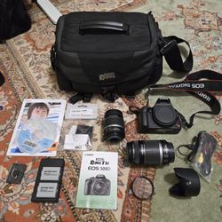 Canon Rebel T1i With Multiple Lenses And Case.