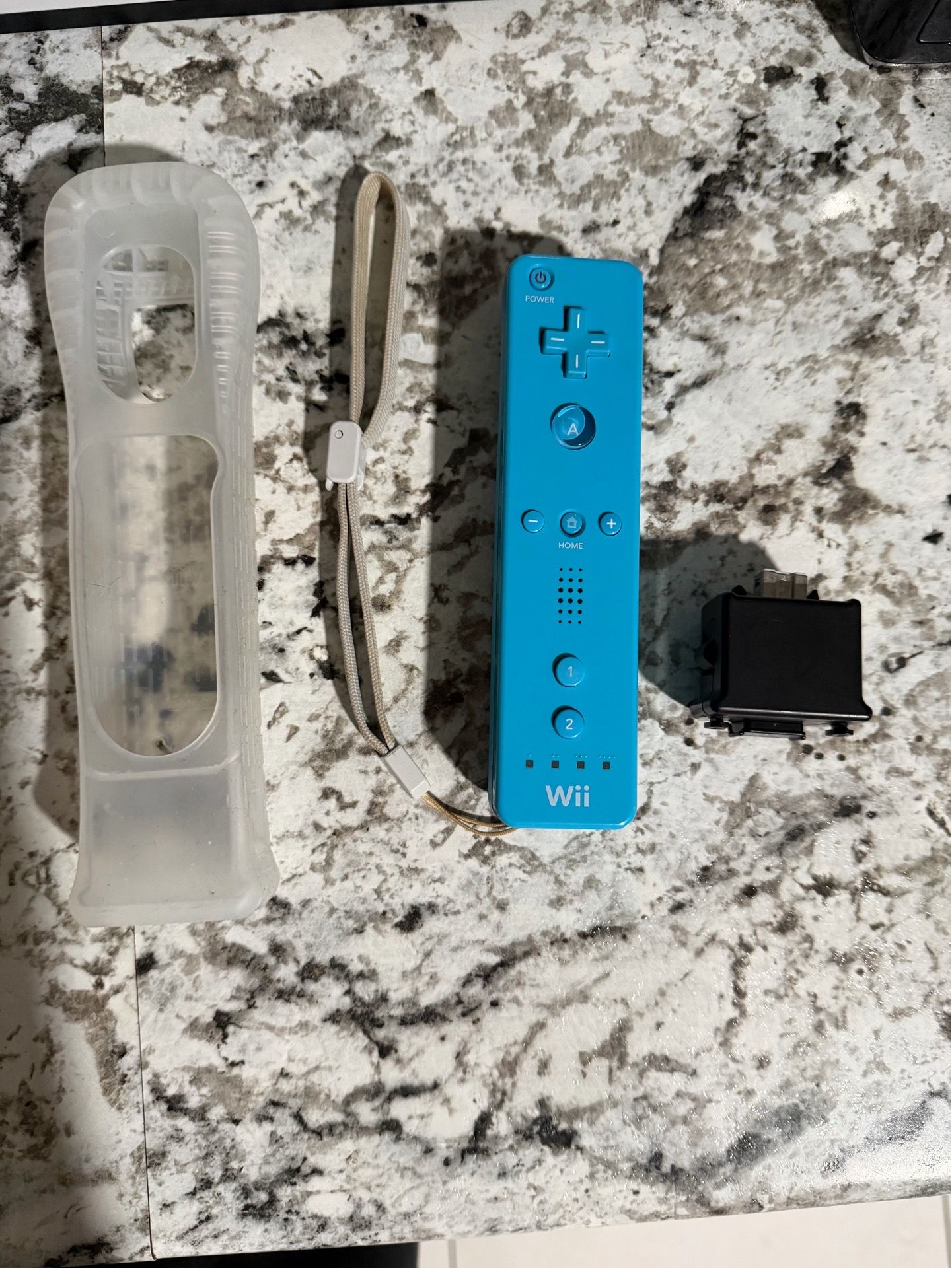 Blue Wii remote with motion plus