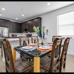 Six Seated Glass Table With Chairs