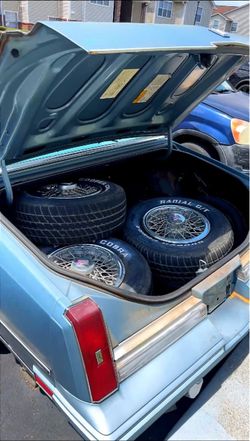 3 original 14” RIMS & HUBCAPS ONLY