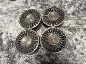 Infiniti or Nissan 15 inch Aluminum wheels and caps. 5 on 114.3mm